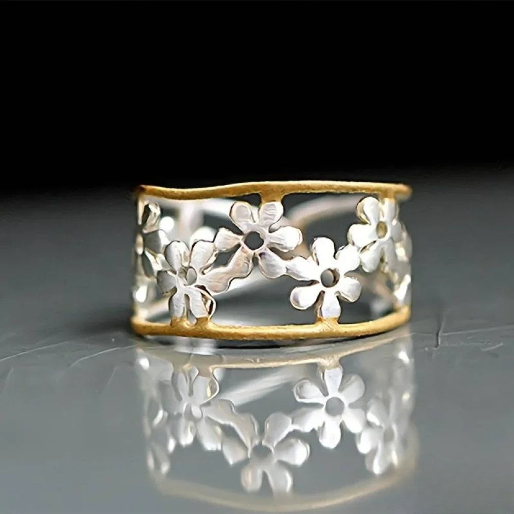 Bague à fleurs irrégulière avec motif creux