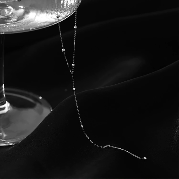 Collier de clavicule avec pompons